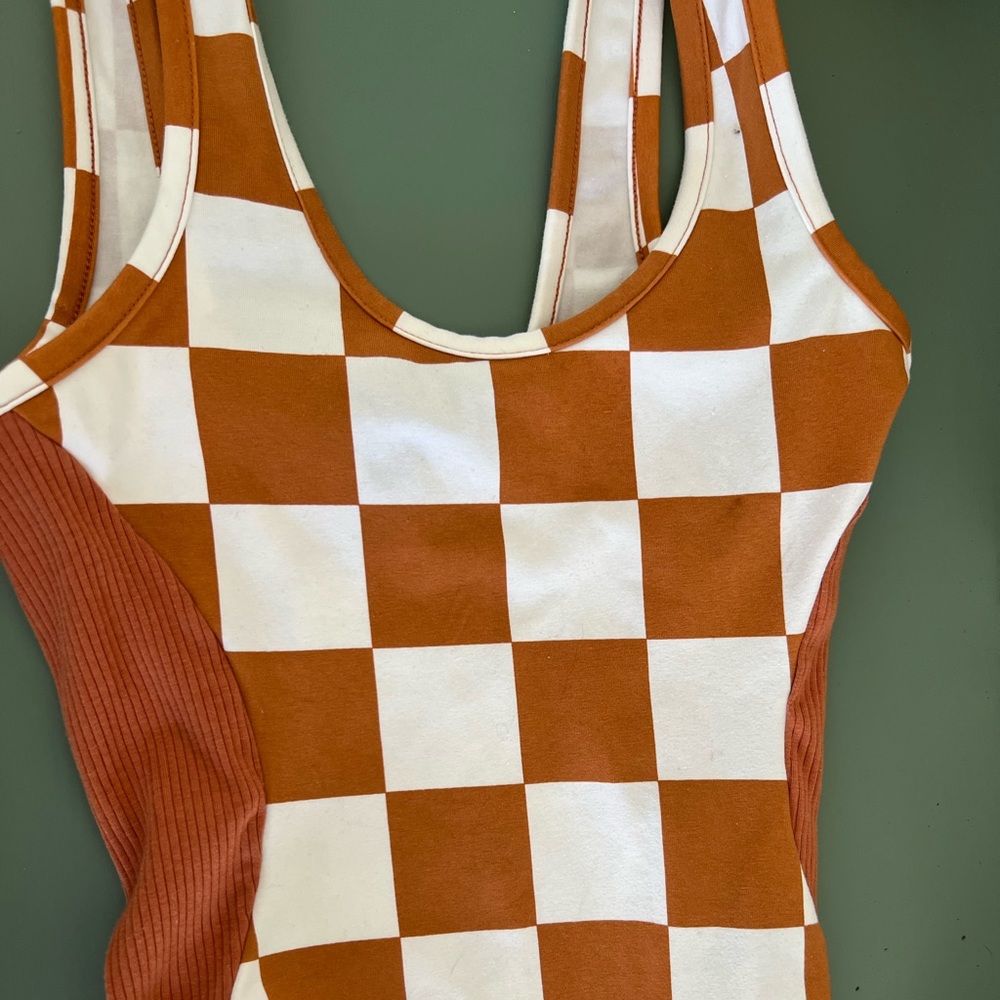 Brand new Checkered body suit